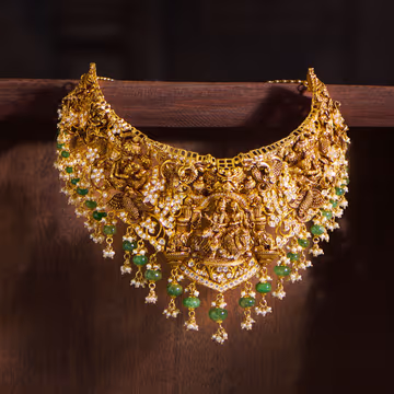 Opulent Kundan Gold Necklace with Green Gem Accents